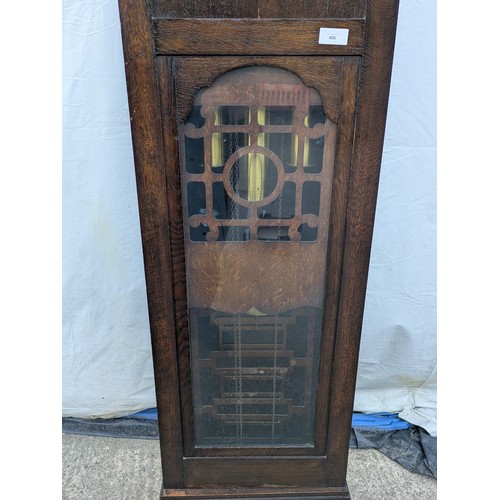 466 - A charming art deco style grandfather clock - chiming urgos movement in a tall oak case