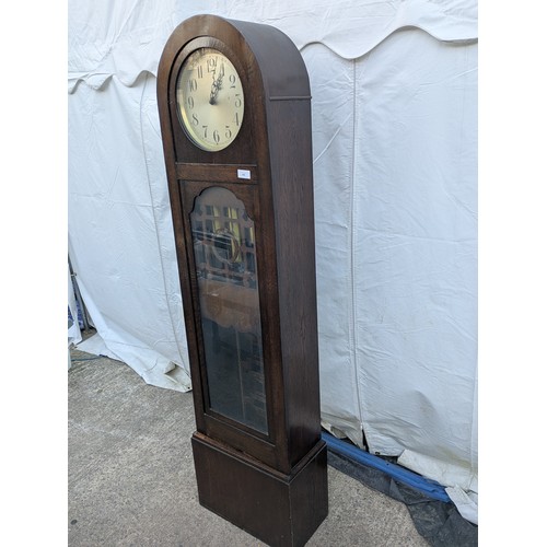 466 - A charming art deco style grandfather clock - chiming urgos movement in a tall oak case