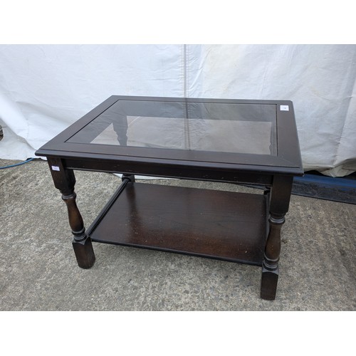 469 - A pine glass top coffee table