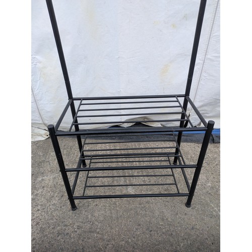 606 - A metal clothes and shoe rack