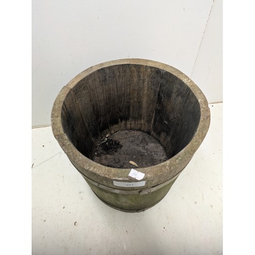 251 - A oak barrell style plant pot