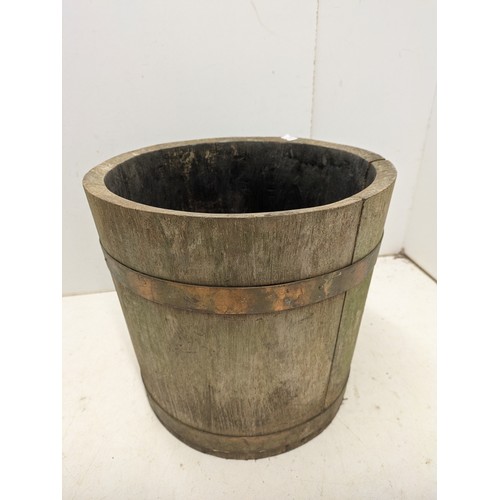 251 - A oak barrell style plant pot