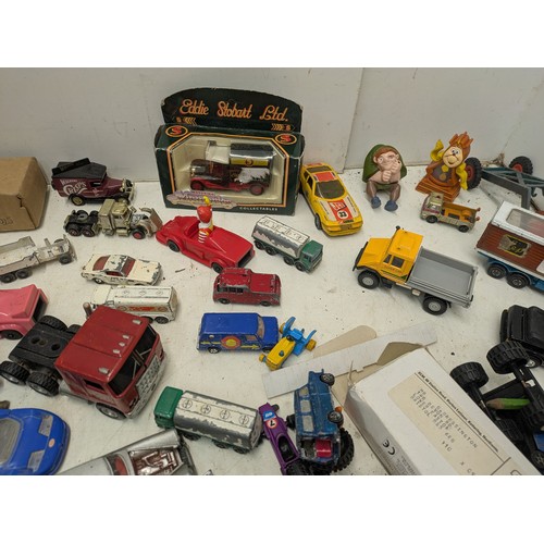 2053 - A large selection of various die cast cars and other toys, including lledo, politoys, etc