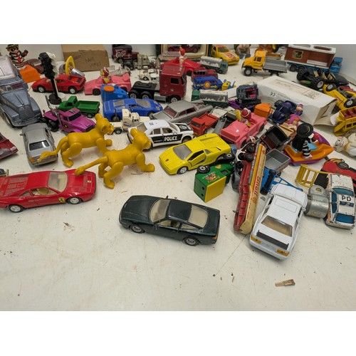 2053 - A large selection of various die cast cars and other toys, including lledo, politoys, etc