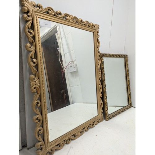 618 - A pair of ornate framed mirrors in gold gilt frames