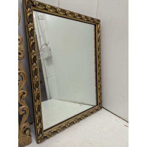 618 - A pair of ornate framed mirrors in gold gilt frames