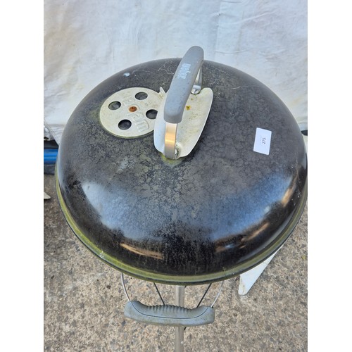 275 - A Weber freestanding coal barbecue