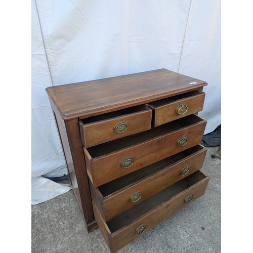 473 - An early 20th century Mahogany graduating chest of drawers with ornate brass handles - in need of ge... 