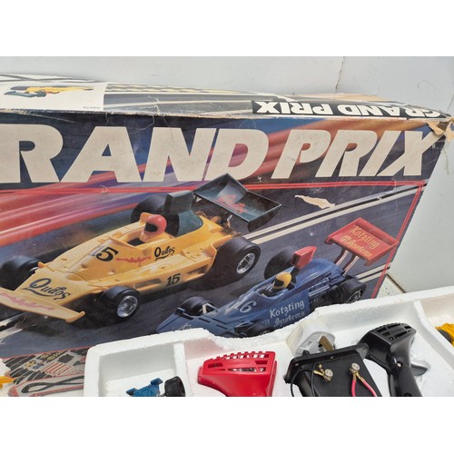 1453 - A Scalextric Grand Prix set in box with 2 cars