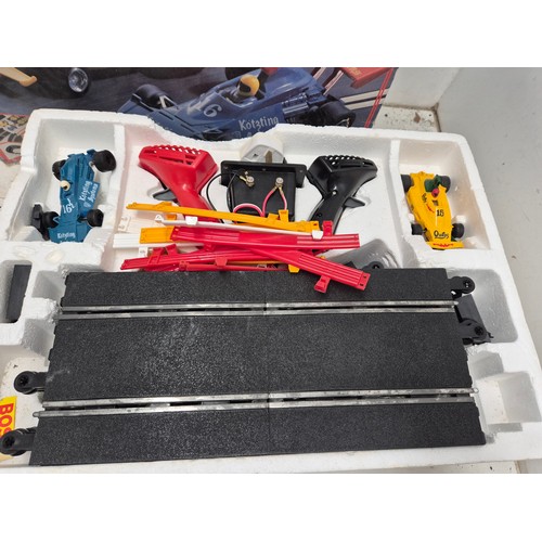 1453 - A Scalextric Grand Prix set in box with 2 cars