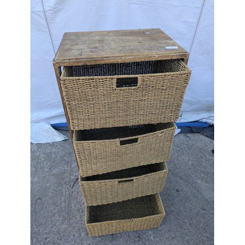 480 - A 4 tier storage unit with wicker drawers