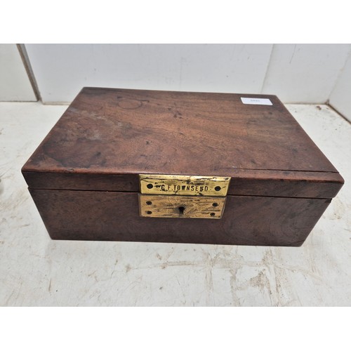 1025 - A vintage mahogany writing box engraved GF Townsend