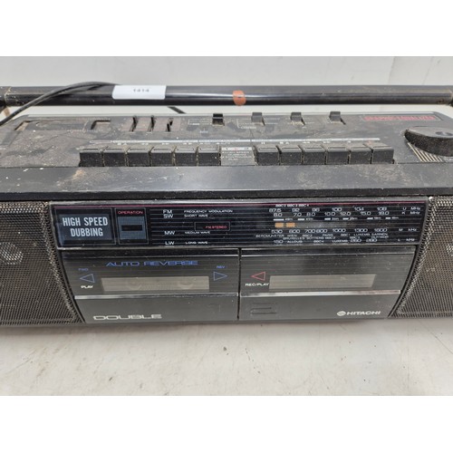 1414 - A Hitachi Stereo radio cassette recorder model trk-w350e