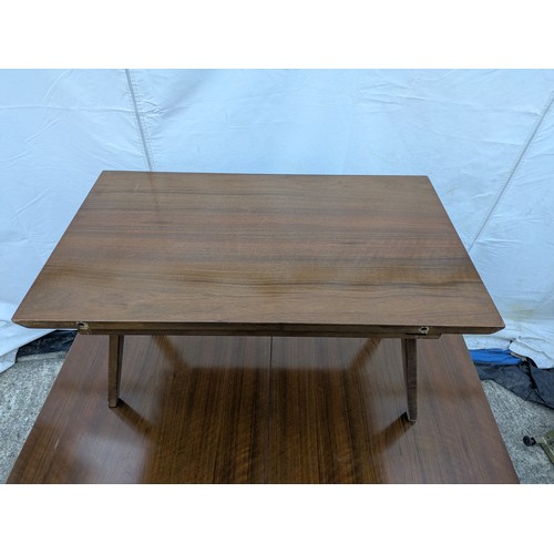 472 - A 'Beautiful-tea-table' extending dining table - centre leaf can be removed and folded out into a co... 