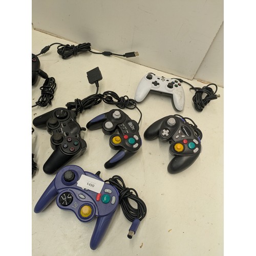 1490 - A selection of video game controllers