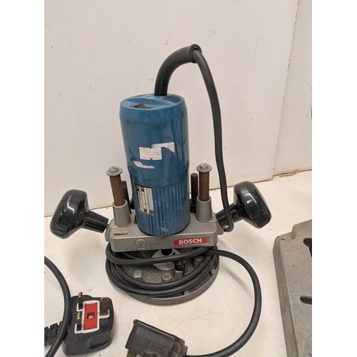 1725 - A Bosch CSB 500-2 drill mounted in a drill press stand and a Bosch router