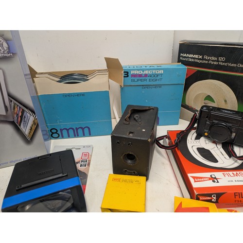 2067 - A selection of vintage glcamera equipment including super 8 reels, flashes, etc