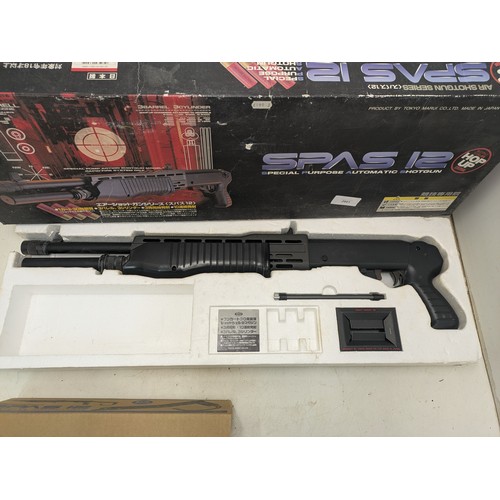 2001 - A Spas 12 Airsoft BB shotgun with metal stock in original box