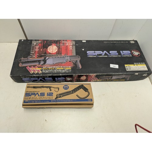 2001 - A Spas 12 Airsoft BB shotgun with metal stock in original box