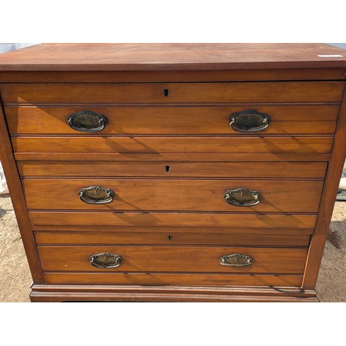 645 - A vintage mahogany 3 drawer chest of drawers with ornate brass handles