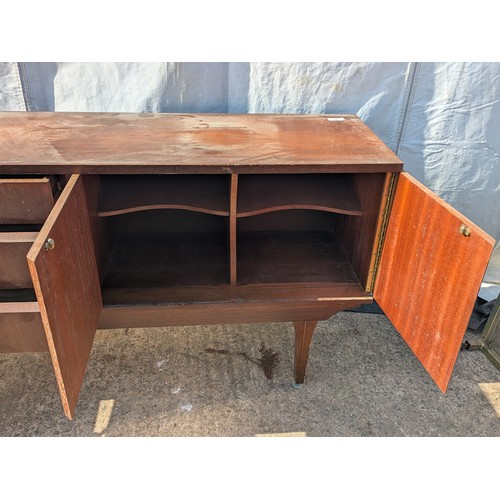 646 - A charming mid-century heavy teak side board with 3 drawers and 2 cupboard spaces