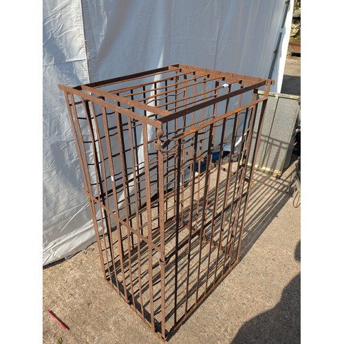 661 - An antique lockable double sided wine cellar storage rack