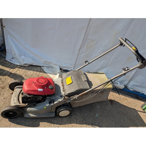 283 - A Honda HRB476C petrol lawn mower