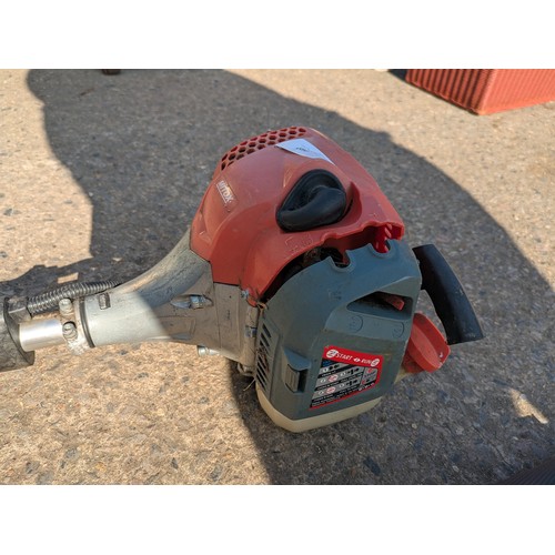 284 - A Mitox select 280 Mt petrol multi tool with various attachments