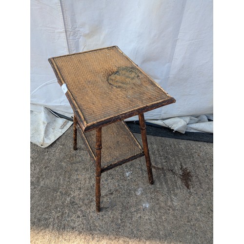 620 - An early 20th century wicker and bamboo table.