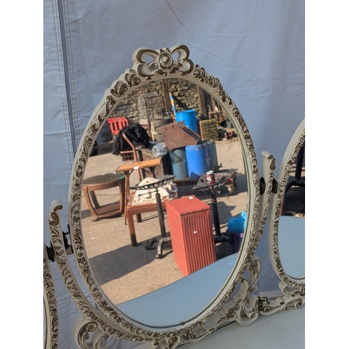 612 - An ornate renaissance style dressing table with three piece mirror and matching stool