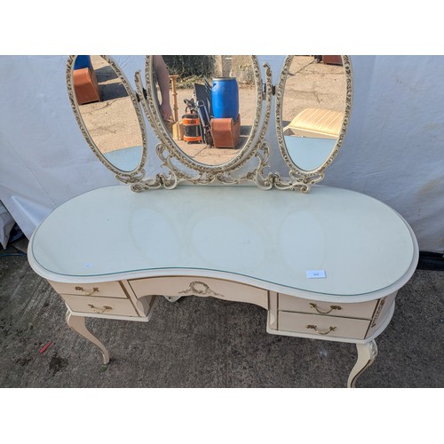 612 - An ornate renaissance style dressing table with three piece mirror and matching stool