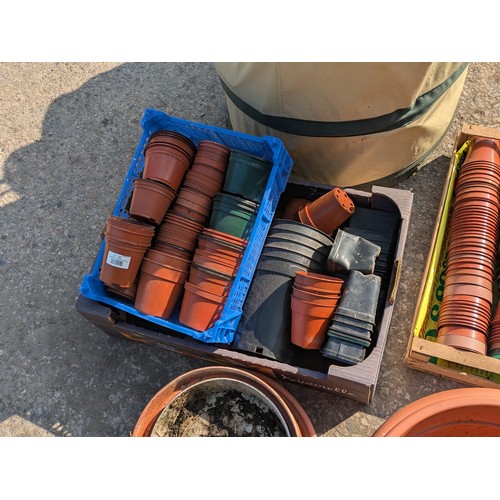 217 - Large selection of plastic garden pots