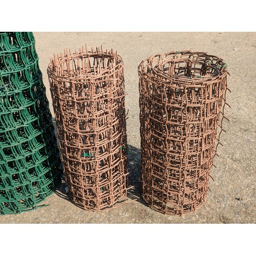 218 - Three rolls of plastic fencing