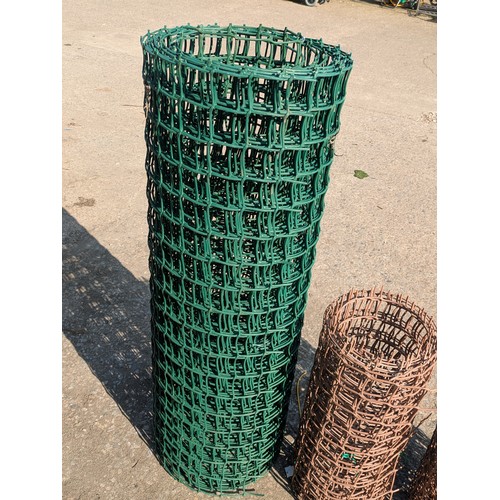 218 - Three rolls of plastic fencing