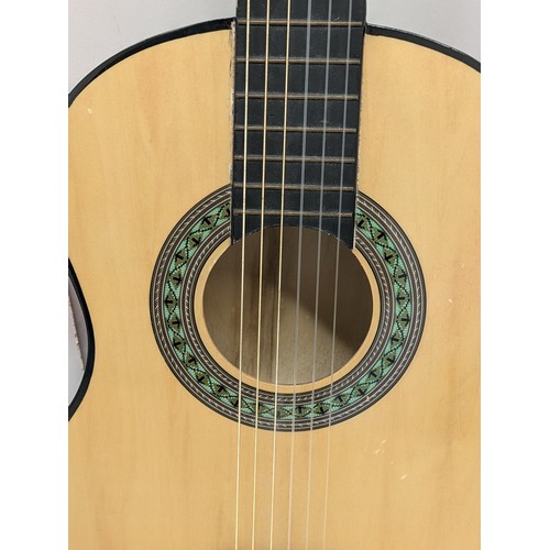 2104 - A children's acoustic guitar