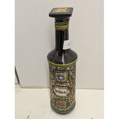 1088 - A pair of decorative bottles including whiskey and gin