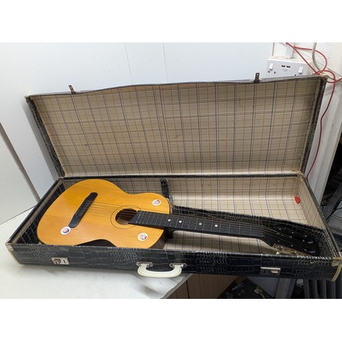 2106 - A crocodile skin effect t hard guitar case with acoustic guitar