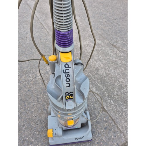 1447 - A Dyson DC04 upright vacuum cleaner