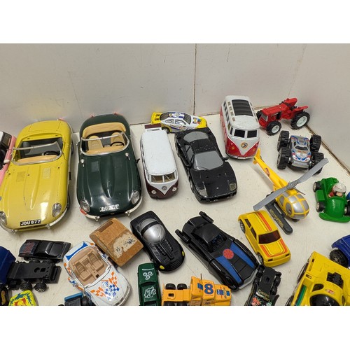 2098 - A selection of die cast and plastic toy cars