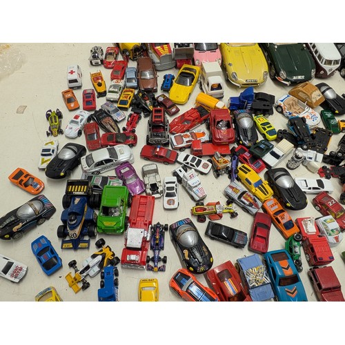 2098 - A selection of die cast and plastic toy cars