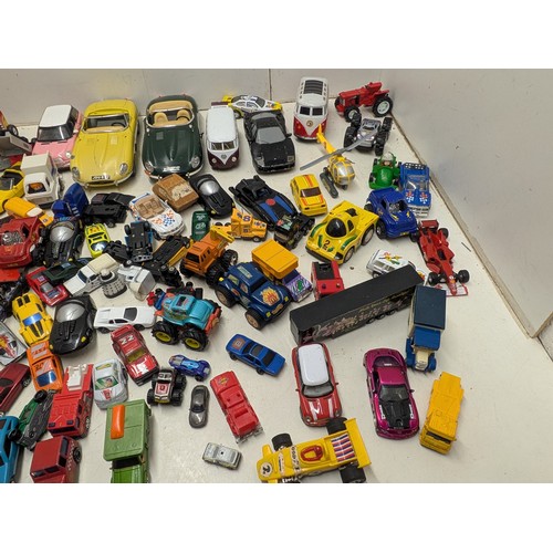 2098 - A selection of die cast and plastic toy cars