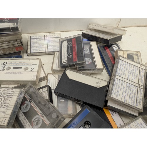 1513 - A large selection of cassettes for use with Zx spectrum and a selection of music cassettes