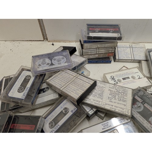 1513 - A large selection of cassettes for use with Zx spectrum and a selection of music cassettes