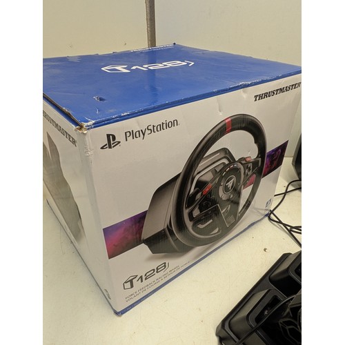 1511 - A thrustmaster T128 racing sim setup in original box (compatible with PC and Playstation)