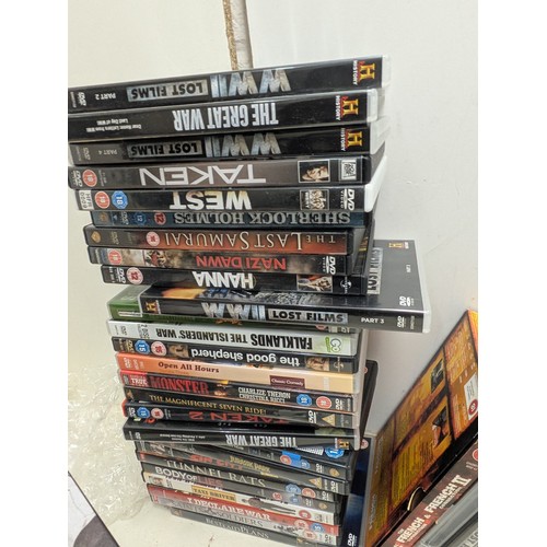 1429 - A large selection of DVDs, CDs and box sets