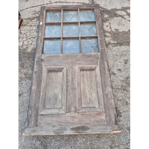 46 - A large external pine and glass door