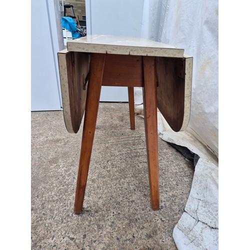 503 - A circa 1070s patterned top drop leaf table