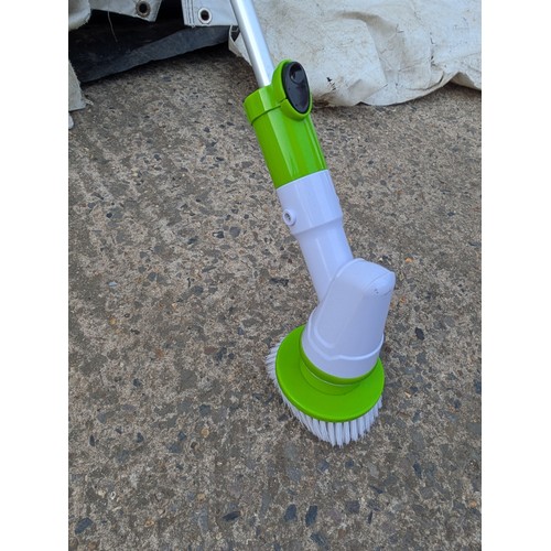 1317 - A Cooper's cordless spin scrubber with attachments