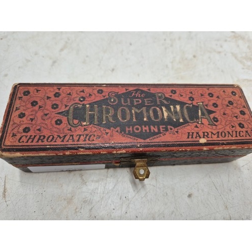 1027 - A Hohner super chromonica harmonica