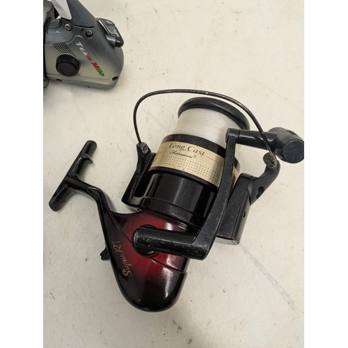 76 - A selection of 4 fishing reels